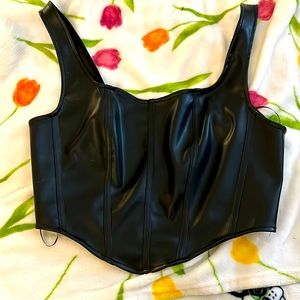 Black tank top fun for a night out on the town! Size large never worn before